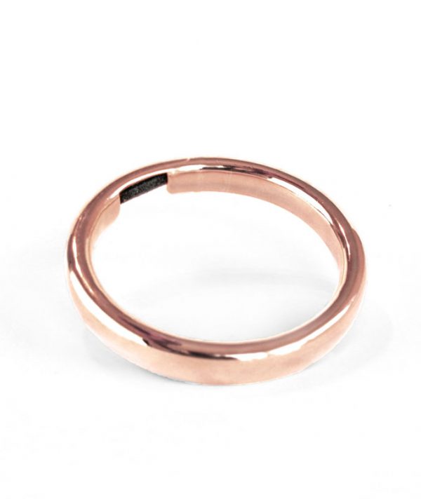 Bangle & Band rose gold plated hair tie bracelet; this beautiful piece of jewelry features a small channel on the side of the bangle for the purpose of holding a hair tie.