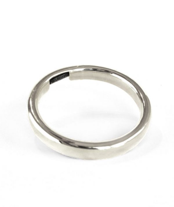 Bangle & Band silver-tone hair tie bracelet; this beautiful piece of jewelry features a small channel on the side of the bangle for the purpose of holding a hair tie.